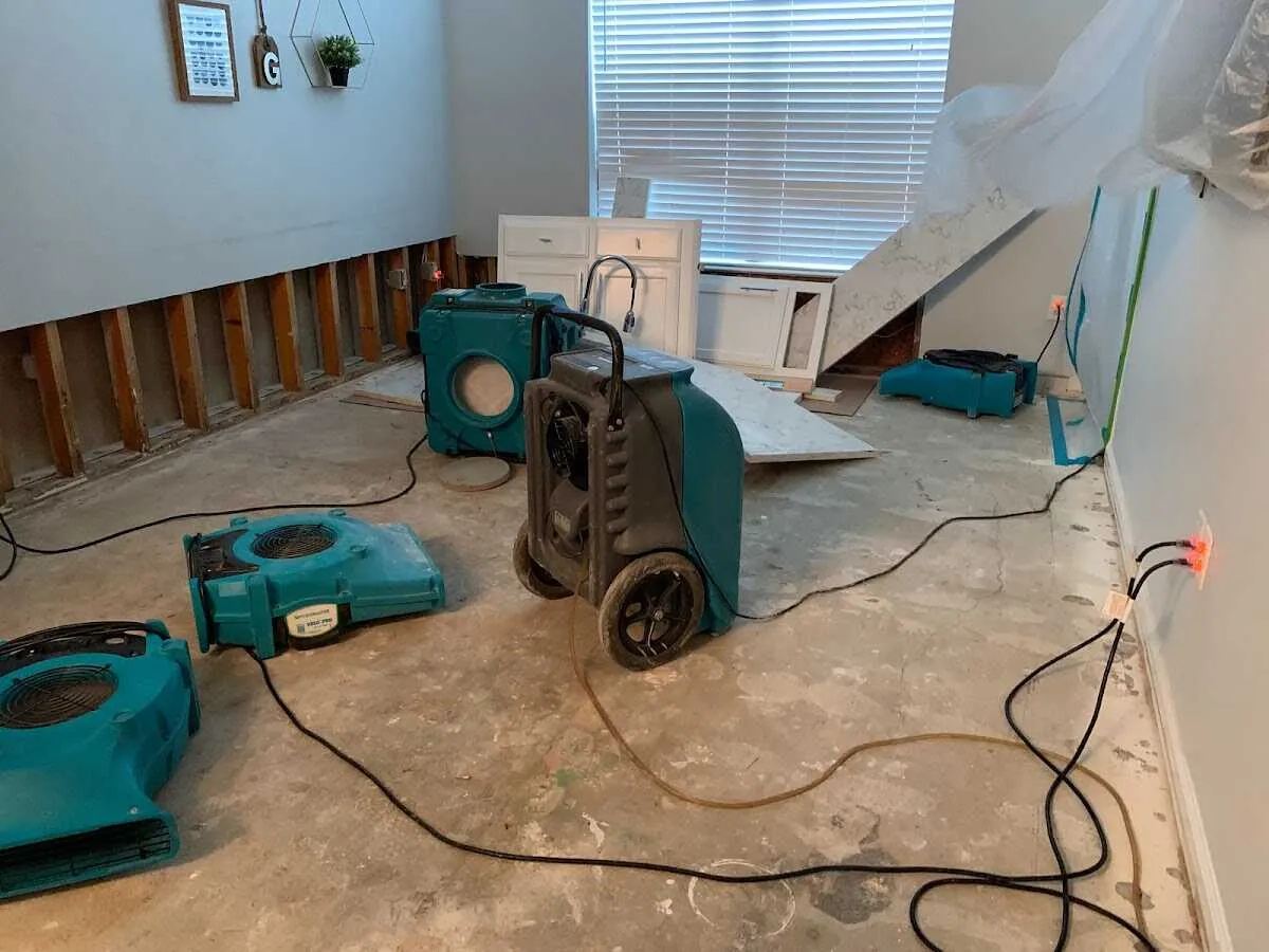 Dehumidifier in flood-cut room for Water Damage Restoration in Medford